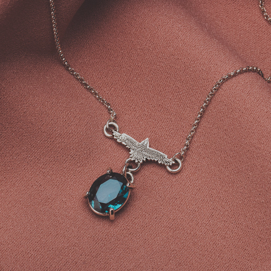 Raven Necklace With Faceted Teal Blue Topaz Gemstone In Sterling Silver | Small Aqua Teal Blue Flying Fly Bird Thunderbird Pendant