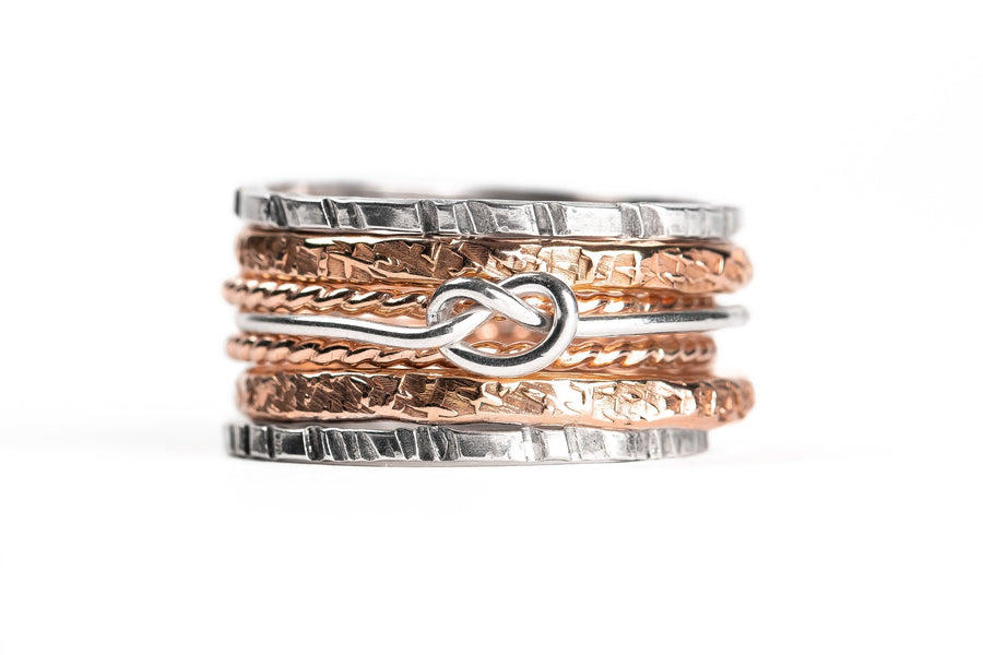 Love Knot Mixed Metal Stacking Ring Set Of 7 | Sterling Silver and 14K Gold Fill Stack Stackable Knotted Tied Hammered Rings | Tie The Knot