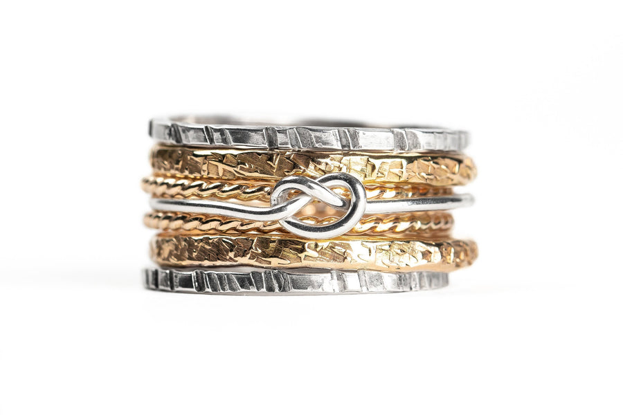 Love Knot Mixed Metal Stacking Ring Set Of 7 | Sterling Silver and 14K Gold Fill Stack Stackable Knotted Tied Hammered Rings | Tie The Knot