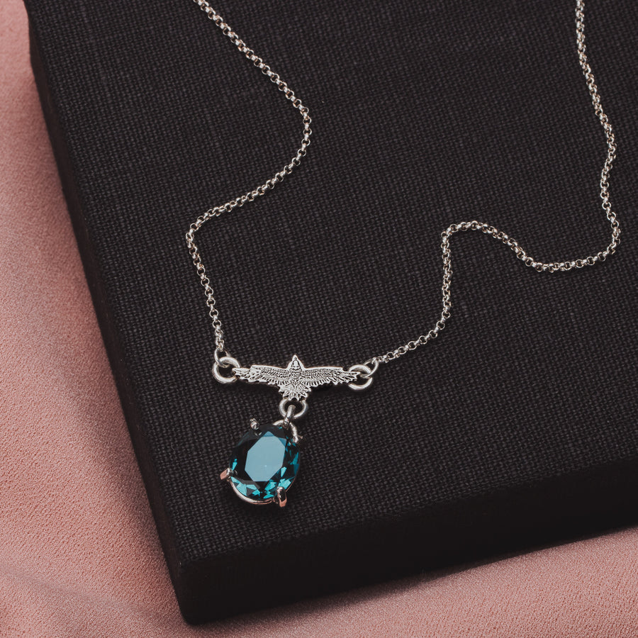 Raven Necklace With Faceted Teal Blue Topaz Gemstone In Sterling Silver | Small Aqua Teal Blue Flying Fly Bird Thunderbird Pendant