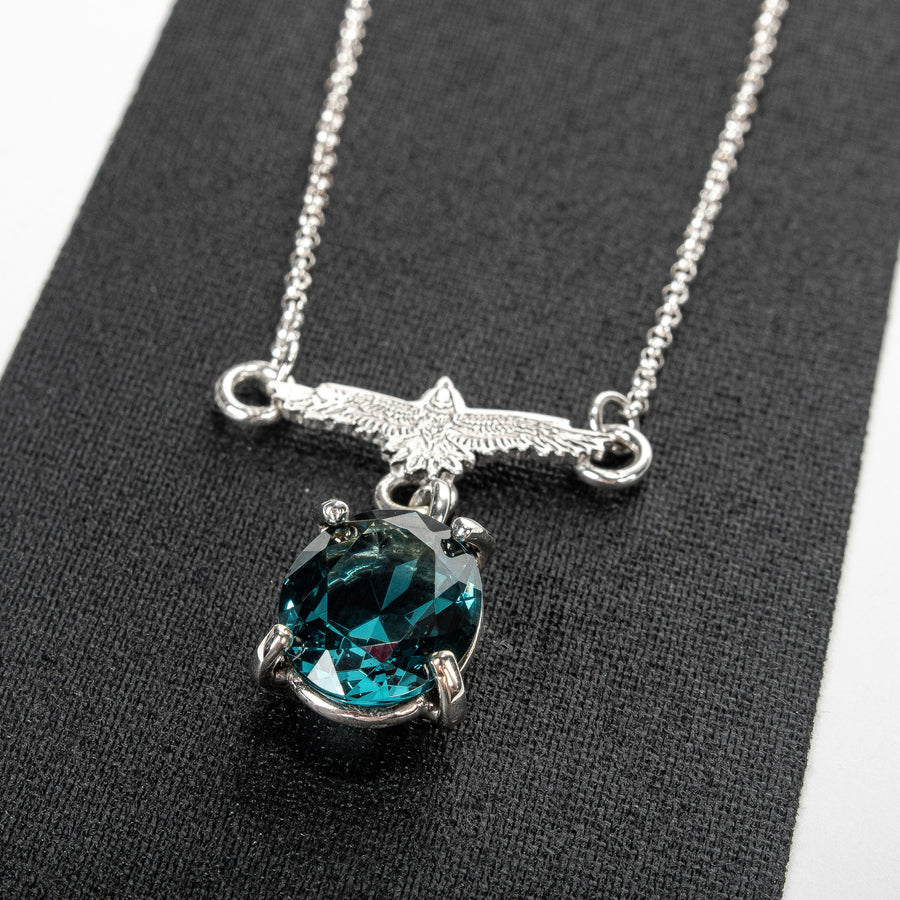 Raven Necklace With Faceted Teal Blue Topaz Gemstone In Sterling Silver | Small Aqua Teal Blue Flying Fly Bird Thunderbird Pendant