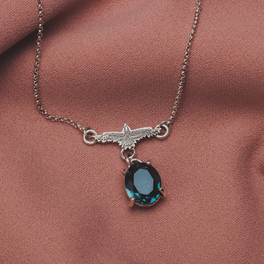 Raven Necklace With Faceted Teal Blue Topaz Gemstone In Sterling Silver | Small Aqua Teal Blue Flying Fly Bird Thunderbird Pendant