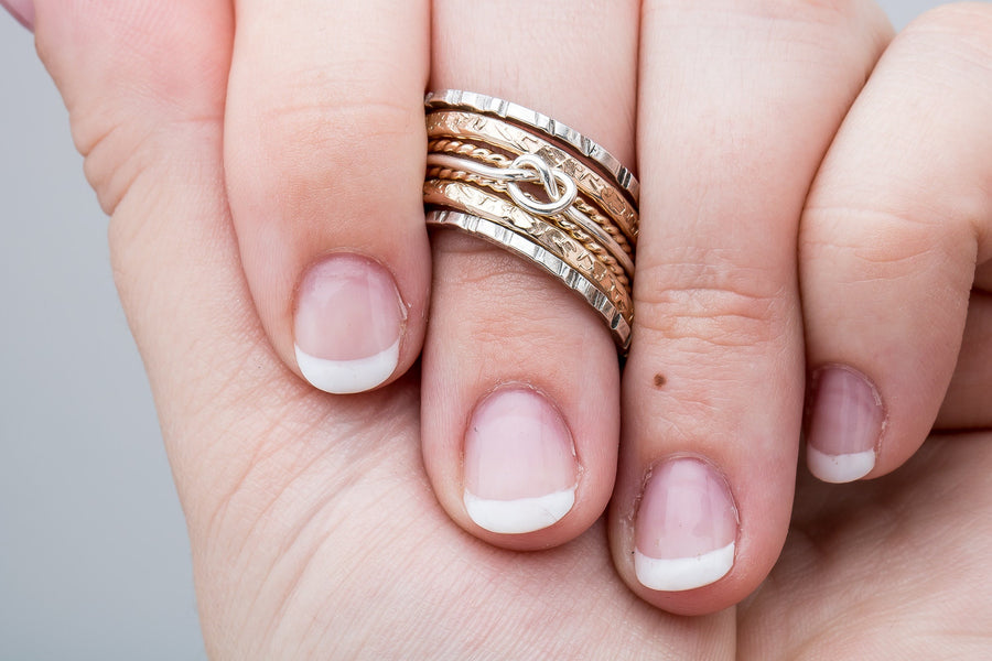 Love Knot Mixed Metal Stacking Ring Set Of Sterling Silver and