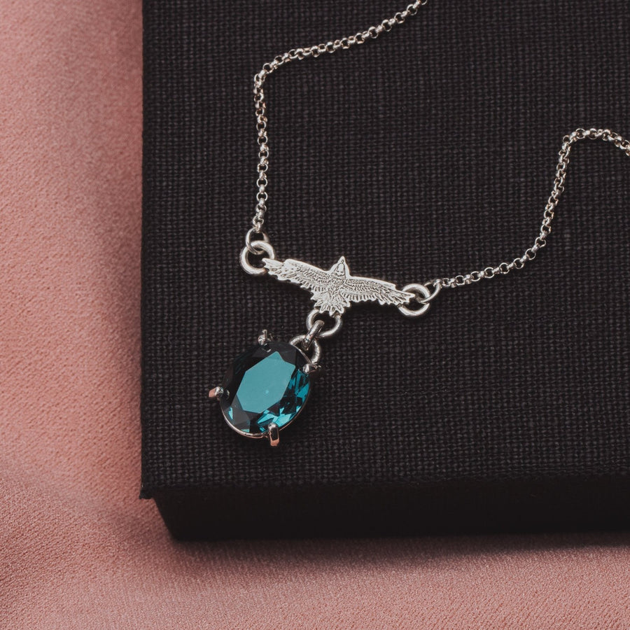 Raven Necklace With Teal Blue Topaz - Melanie Golden Jewelry - fauna, gemstone necklace, necklace, necklaces, symbolic, The River Valley Collection