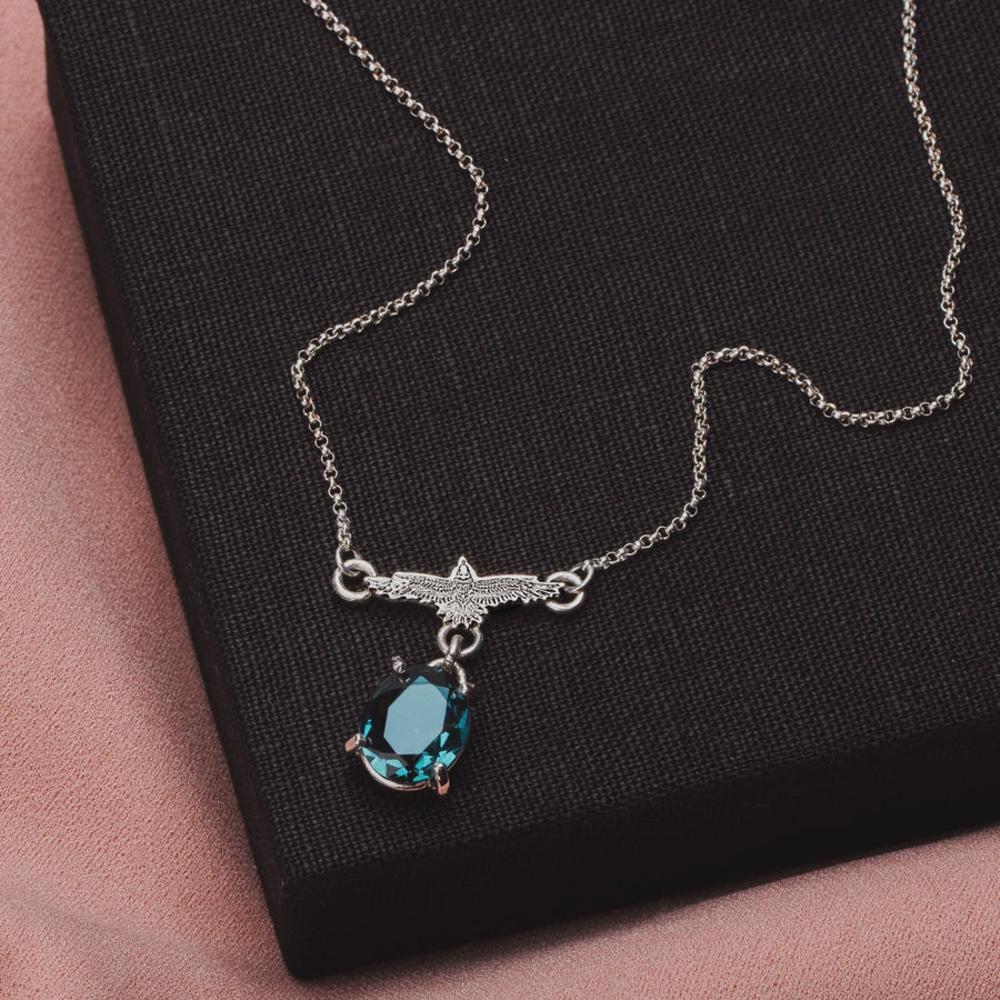 Raven Necklace With Teal Blue Topaz - Melanie Golden Jewelry - fauna, gemstone necklace, necklace, necklaces, symbolic, The River Valley Collection